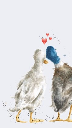 two birds standing next to each other on a white surface with hearts in the background