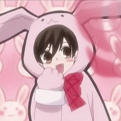 an anime character with bunny ears holding her hand up to her mouth