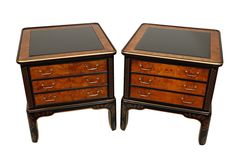 a pair of wooden drawers with glass top