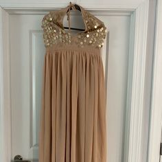 Beautiful Long Glamorous Embellished Maxi Dress, Perfect For Any Occasion Sleeveless Embellished Bridesmaid Maxi Dress, Embellished Sleeveless Bridesmaid Maxi Dress, Gold Flowy Dress For Party, Flowy Gold Dress For Party, Gold Flowy Party Dress, Embellished Bridesmaid Dress For Party Season, Embellished Maxi Dress For Party Season, Bridesmaid Maxi Dress With Sequins, Embellished Sequin Bridesmaid Dress