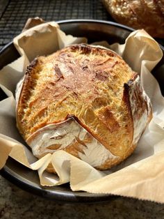 a loaf of bread sitting on top of a pan