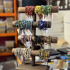 there are many bracelets on display in the store