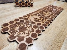 the wooden table is made to look like hexagons and honeycombs