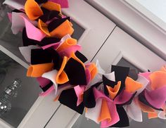 a close up of a wreath on a door