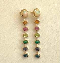 These M. Spalten 14K YG Sunbeam Rainbow Earrings, feature Opal Tops, Citrine, Pink Tourmaline, Peridot, Emerald, Iolite, Blue Topaz Disposable Income, Stacked Earrings, Ear Stack, Rainbow Earrings, Jewelry Lookbook, Ear Rings, Colorful Earrings, 2024 Fashion, Emerald Cut Diamonds