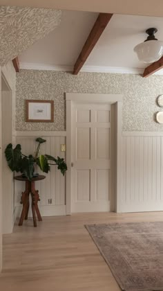 Olof sage green sandberg wallpaper with Edgecomb gray BM painted trim. Plates on wall, schoolhouse lights. Hal Decor, Dream House Interior, A Living Room, Dream House Decor, Ideas Home, Cottage Homes, House Inspo, Dream Home Design, House Inspiration