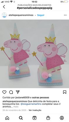 two peppa pig figurines wearing crowns on top of each other with stars