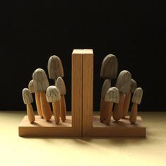 several wooden figures are stacked on top of each other