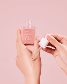 Formulated with a potent 5% concentration of Niacinamide, this serum effectively inhibits melanin pigment ensuring a more balanced complexion. Crafted with sensitivity in mind, this serum boasts 120 hours of low-temperature fermented peaches, preserving their niacinamide-rich properties while being gentle even on the most delicate skin types.The skin-nourishing effects of Vitamin B12, coupled with triple hyaluronic acid and pink yeast, deliver deep hydration and vitality to lackluster skin. Enha Fermented Peaches, Beauty Product Photography Ideas, Serum Photography, Skincare Advertising, Skincare Organiser, Pink Serum, Hydration Skincare, Packaging Skincare, Korean Serum