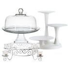 three tiered cake stand with glass dome on top