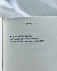 an open book with a poem on it