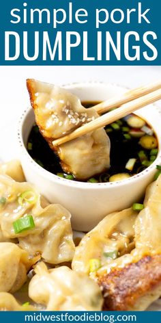 some dumplings are being served with chopsticks