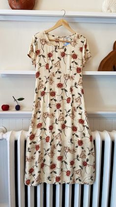 Vintage 90s floral print summer dress  The most beautiful pale golden yellow color with an interesting floral motif 🌼 Has a matching string tie at the waist  Elegant and timeless In excellent condition with no flaws or damage  Best for a women's size small or medium  Length: 46" Underarm to underarm: 20" Sleeve: 6.25" Waist: 18" Hip at widest point: 22" Ships tracked and insured within 1-3 business days from Canada. __ Due to the high cost of shipping I do not offer exchanges or returns. Please Floral Sun Dress, Print Summer Dress, Floral Print Dress Summer, Golden Yellow Color, 90s Floral, Butter Yellow, Dress With Tie, Sun Dress, Golden Yellow