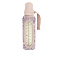 a thermos bottle with a measuring tape on it's side and a pink strap