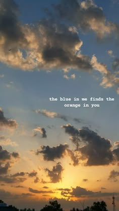 the sky is filled with clouds and there is a quote above it that says, the blue in me finds the orange in you