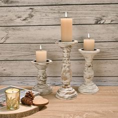 PRICES MAY VARY. 【Excellent Craftsmanship】Our pillar candle holder set of 3 are made of premium natural wood, which is sturdy and durable. All of the wood candle holders with a graceful shape are finished by excellent craftsmen. The wood grains are retained on the candlestick and the surface is so smooth. 【Table Centerpieces】It is a good choice to use the wooden candle holders as candle stands for pillar candle. The candlestick holders would be an elegant dining room table decor. Put them with l Rustic Wood Candle Holders, Farmhouse Candle Holders, Room Table Decor, Romantic Candle Light Dinner, White Candle Holders, Farmhouse Candles, Tall Candle Holders, Pillar Candle Holder, Dining Room Table Decor