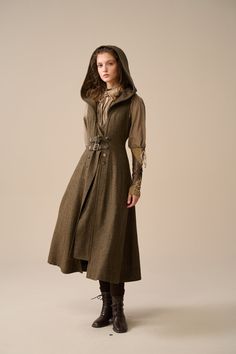 When it comes to autumn/winter aesthetics, we say the cosier the better, which is why this hooded wool dress is the perfect choice for autumn/winter! This hooded dress is as classic as it is chic! The rich, dark tones evoke a sense of nostalgia and fantasy. The hood design adds extra warmth and whimsy, turning a simple walk into a fairytale adventure. Whatever the weather, you're  be ready to take on the world with a smile on your face and a spring in your step. 【Fabric】 Outer: 100% Wool Lining:  100% Viscose  Linennaive pays more attention to the experience and long-term value of an item. Each linennaive coat needs to be hand-sewn to a length of nearly 8 meters, and generally requires 3000-4000 back and forth stitches. It will allow people with the same taste to express a tacit understand Comfy Fantasy Outfits, Fantasy Clothing Inspiration, Dnd Winter Clothes, Medieval Winter Clothes, Winter Fantasy Clothing, Fantasy Winter Clothes, Fantasy Adventurer Outfit, Traditional French Clothing, Fantasy Coat