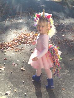 DIY Unicorn Halloween Costume! What a beauty she is. Adult Unicorn Costume Diy, Unicorn Diy Costume, Unicorn Halloween Costume For Women, Unicorn Costume Toddler, Unicorn Costume Womens, Toddler Unicorn Costume