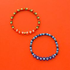 Sly Fox (Nick Wilde) and Carrots (Judy Hopps) bracelets! Please make your selection using the drop down menu. *Link to the Change Starts With You bracelet set: https://www.etsy.com/listing/1739633382/ Handmade with love using Czech glass beads, colored letter beads and stretch cord. SIZING: Measure your wrist around the widest point and add .25-.5 inches to get the most comfortable or desired fit. CARE INSTRUCTIONS: Please be careful to not overstretch bracelets too far. They are made out of a durable elastic string but are still capable of breaking if not handled carefully. Avoid submerging bracelets in water and store in a dry place. I'd love to see how you wear and stack your bracelets! Feel free to tag @colieandco in your Instagram photos ♡ Disney Beaded Bracelet, Disney Friendship, Bestie Bracelets, Neat Crafts, Nick Wilde, Bracelet Inspo, Friendship Bracelets Designs, Judy Hopps, Jewelry Beaded