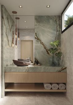 a modern bathroom with marble walls and flooring