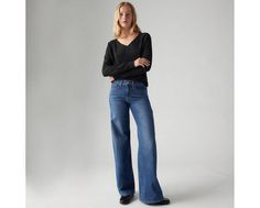 It's all in the name. Our supportive, soft 318 Shaping Wide-Leg jeans lengthen your legs, hug your curves and celebrate your features. Plus, they're designed with a built-in front panel that smooths and supports. Super-comfortable jeans with a flattering wide-leg silhouette Made to flatter your figure and celebrate your form Designed with a built-in tummy panel that flatters, smooths and supports Authentic denim character enhanced with supersoft stretch. For jeans that'll leave you starry-eyed. That's Levi's® Stellar Stretch. Thanks to excellent built-in recovery, they champion your curves and move with you;without sagging or bagging;everywhere and every wear. Starry Eyed, Comfortable Jeans, Form Design, Wide Leg Jeans, Leg Jeans, Women's Jeans, Levi's, Wide Leg, Women Jeans