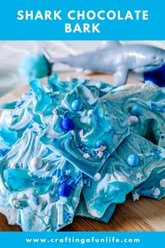 a close up of a plate of food with blue and white frosting on it