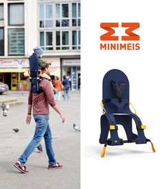 a man with a child on his back walking in front of a minimies chair