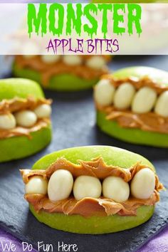 halloween monster mouths made out of green apples with peanut butter on top and white chocolate in the middle