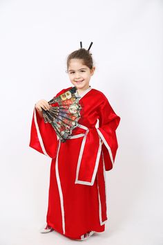 Kimono children's dresses are stylish and comfortable dresses inspired by Japanese culture. Suitable for both girls and boys, these dresses stand out with their wide cuts and comfortable fabrics that allow children to move. Kimono children's dresses keep children cool with their light and thin fabrics, which are preferred especially in summer. In addition, they can be used in accordance with different styles thanks to various pattern and color options. If you want to add a different touch to you School Event Dress, Dress School, Japanese Kids, Children's Dresses, Asian Countries, Event Dress, School Event, Japanese Dress, Dress Stand