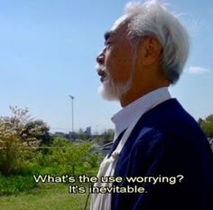 an older man standing in front of a field with a kite flying above him and the words what's the use worrying? it's inevitableable