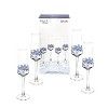 six wine glasses are lined up in front of a white background