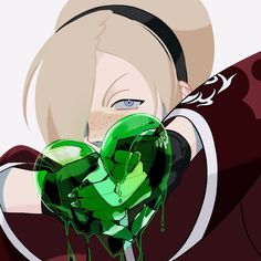 an anime character holding a green heart in his hands and looking at the camera with blue eyes