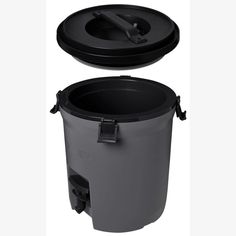 two black and gray trash cans with lids