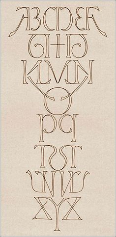 an old fashioned font that has been drawn on paper