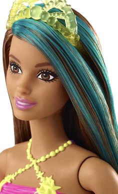 a barbie doll with blue and green hair