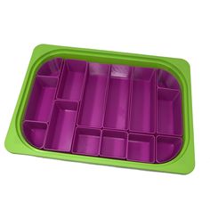 a green and purple tray with compartments on the bottom that have dividers for each compartment