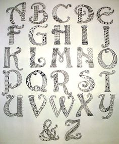 the letters are drawn in black and white with different patterns on each letter's surface