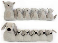 a group of stuffed animals sitting next to each other in front of a white background