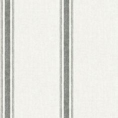 a white and grey striped wallpaper with vertical stripes