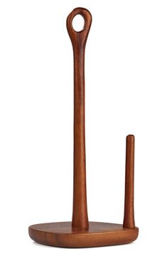 a wooden object with a long handle on the top and a small stick sticking out of it