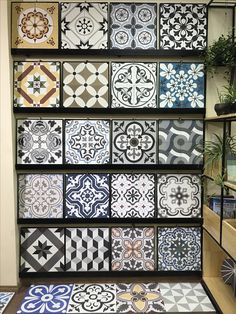 an assortment of tiles on display in a store