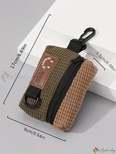 a small pouch with a keychain attached to it