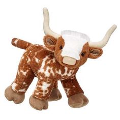 a brown and white stuffed animal with horns