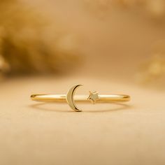 Astrid Just for you, the moon, and the stars. Handcrafted in 14k or 18k solid gold to ensure you never go without them. It is also available in different sizes for the best comfort fit. - Handmade- Solid Gold- Band Thickness: 1.1 mm- Size of the Moon: 4.5 mm- Size of the Star: 2.5 mm All pieces come beautifully boxed in suede pouches you can always use (which really comes in handy when traveling!) Star Minimalist, Moon Star Ring, Gold Cuff Ring, Dream Accessories, Accessories Board, The Moon And The Stars, Silver Ring Band, Ring Bands, Moon And Star Ring