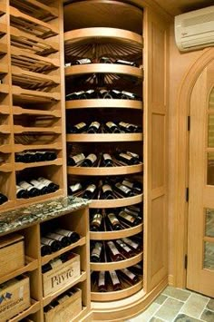 a wine cellar filled with lots of bottles