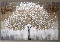 a large painting with a tree on it's side in grey and gold tones