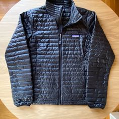 Excellent Condition! Please See The Photos I Have Attached. If You Need Measurements Feel Free To Ask! I Always Try To Ship Out The Item Within 2 Business Days! Casual Patagonia Nylon Puffer Jacket, Patagonia Winter Half-zip Outerwear, Winter Patagonia Nylon Puffer Jacket, Black Patagonia Jacket, Patagonia Winter Outerwear, Midweight, Patagonia Jackets, Patagonia Jacket, Patagonia Womens, Patagonia