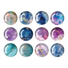 nine glass marbles with different colors and designs