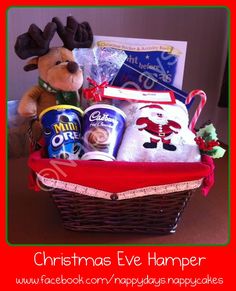 a christmas eve hamper gift basket filled with food and snacks for the holiday season