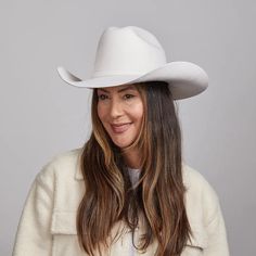 Cattleman White | Womens Felt White Cowgirl Hat is a striking statement piece crafted from midweight felt wool. Featuring a classic cattleman shape with a 4" brim and a felt band adorned with a three-piece buckle, this hat combines timeless elegance with western charm. Perfect for adding flair to any look. Material: Midweight Felt Wool Shape: Cattleman Trim: Felt Band with Three Pieces Buckle Brim Size: 4” Crown Height: 4 1/2” Sweatband: AHM Velcro Imported White Cowgirl Hat, Cowboy Hat Crafts, Cowboy Hat Band, Straw Cowgirl Hat, White Cowboy Hat, Brown Cowboy Hat, Felt Cowboy Hat, Cowboy Hat Bands, Hats For Big Heads